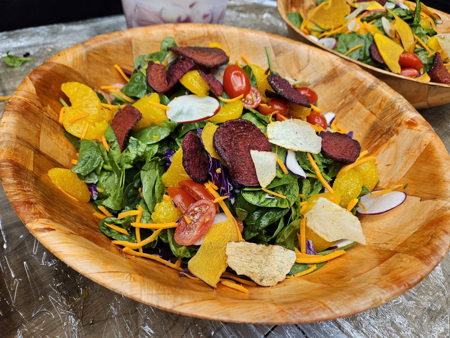 Wooden bowl of beet and citrus salad